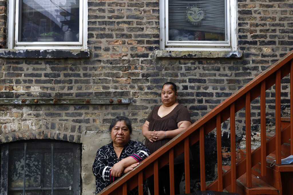 APTOPIX Immigrants Health Insurance
